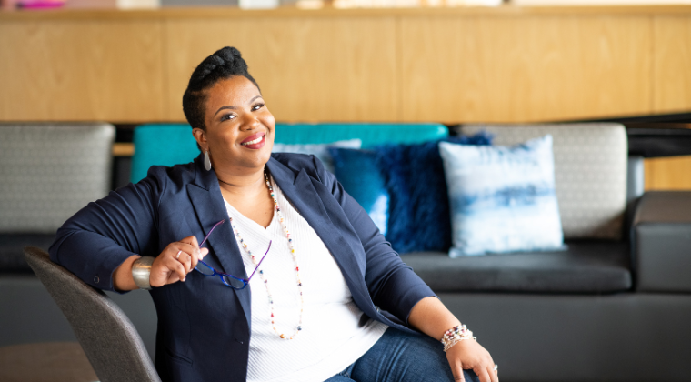 shan-nel d simmons smiling smile pearls jeans bracelet founder ceo nelsmart pillows throw lipstick glasses blue white wood teal cyan light